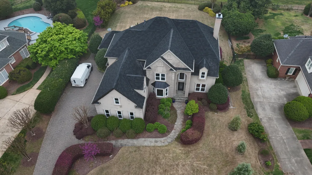 Custom architectural shingle roof installation on a Sussex County luxury estate featuring premium GAF materials in a designer color palette, showcasing Your Neighbor's Contractor's expert craftsmanship with proper flashing, ventilation, and warranty protection for upscale Delaware homeowners.