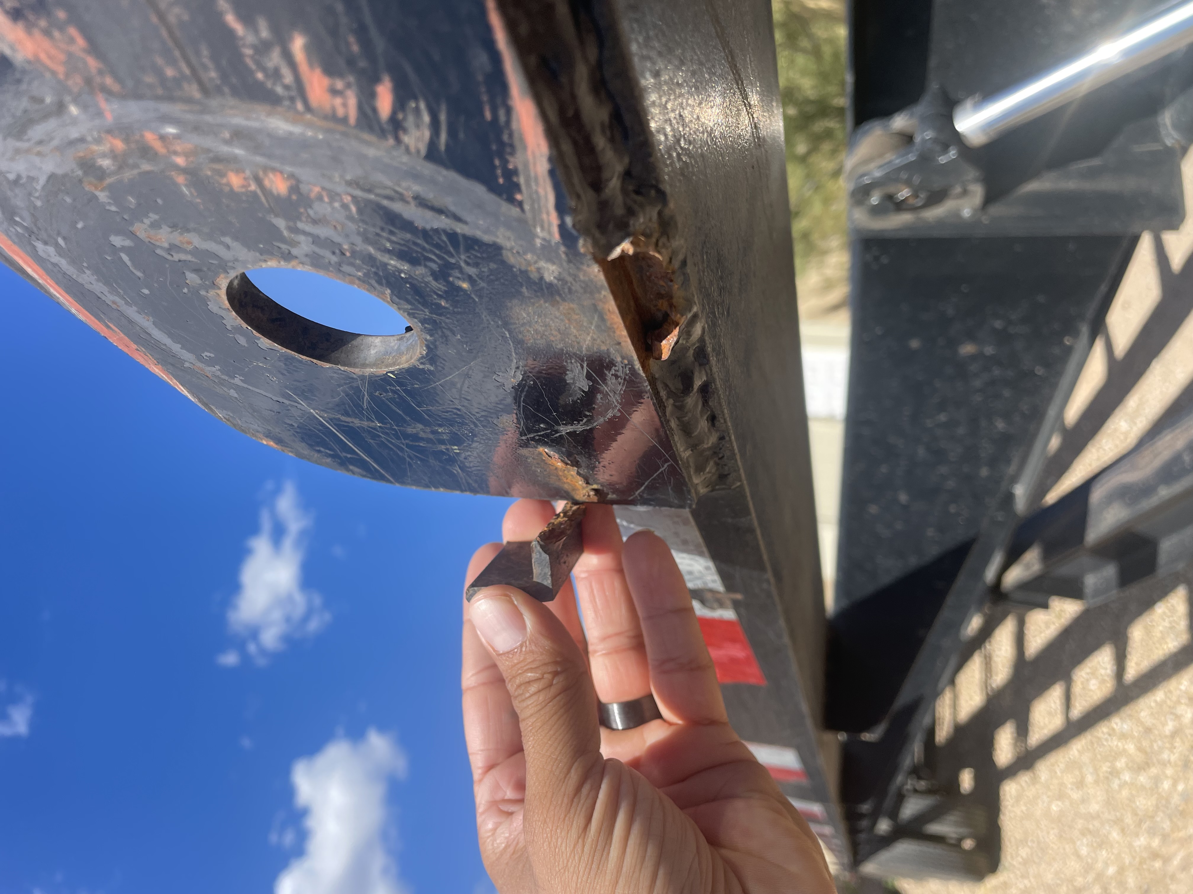 Close-up of a welded trailer attachment, showcasing Walker Mobile Welding's precision and expertise in mobile welding repairs in Tucson, AZ.