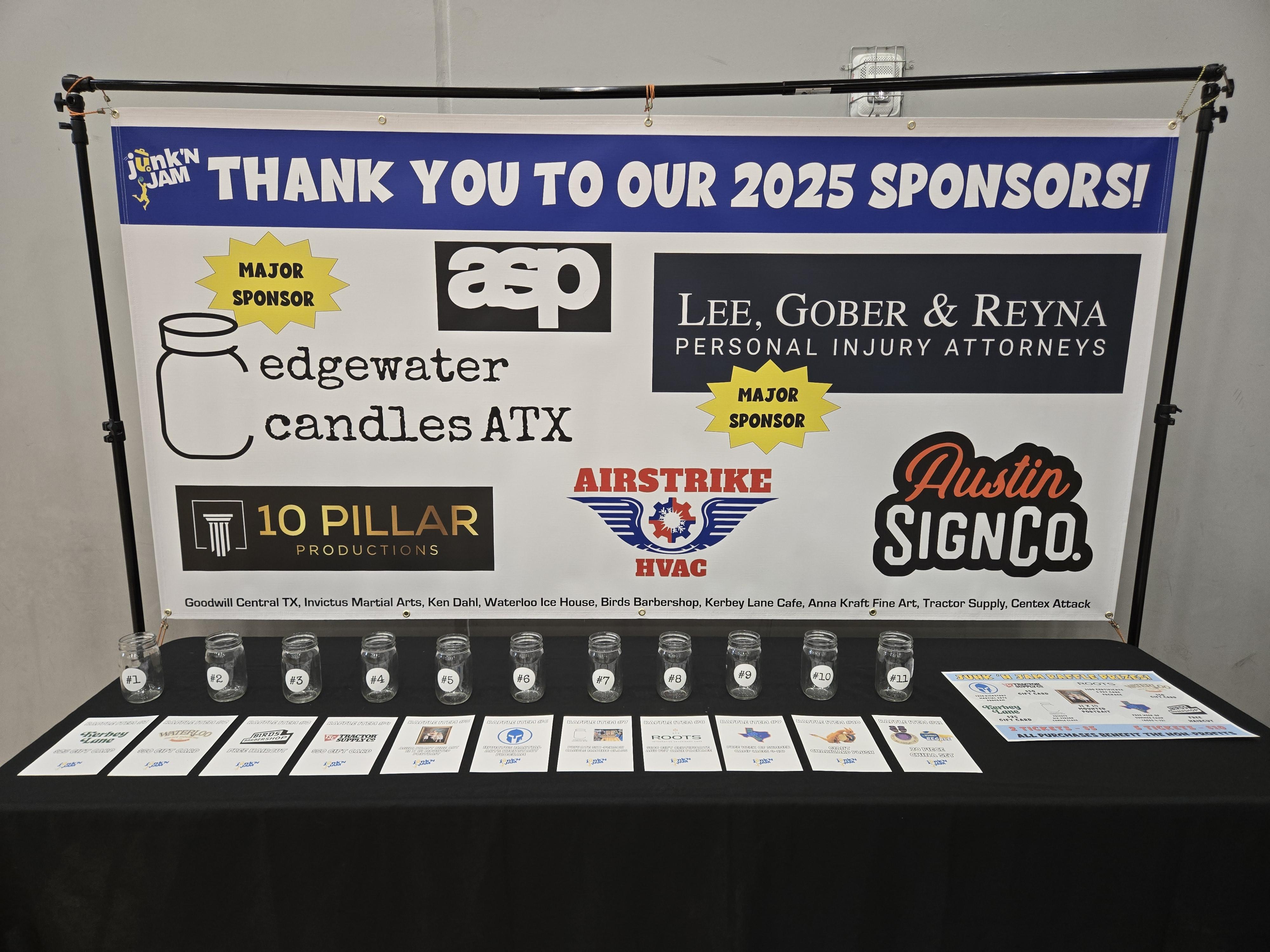 Sponor banner and raffle table at Junk ' Jam 2025
