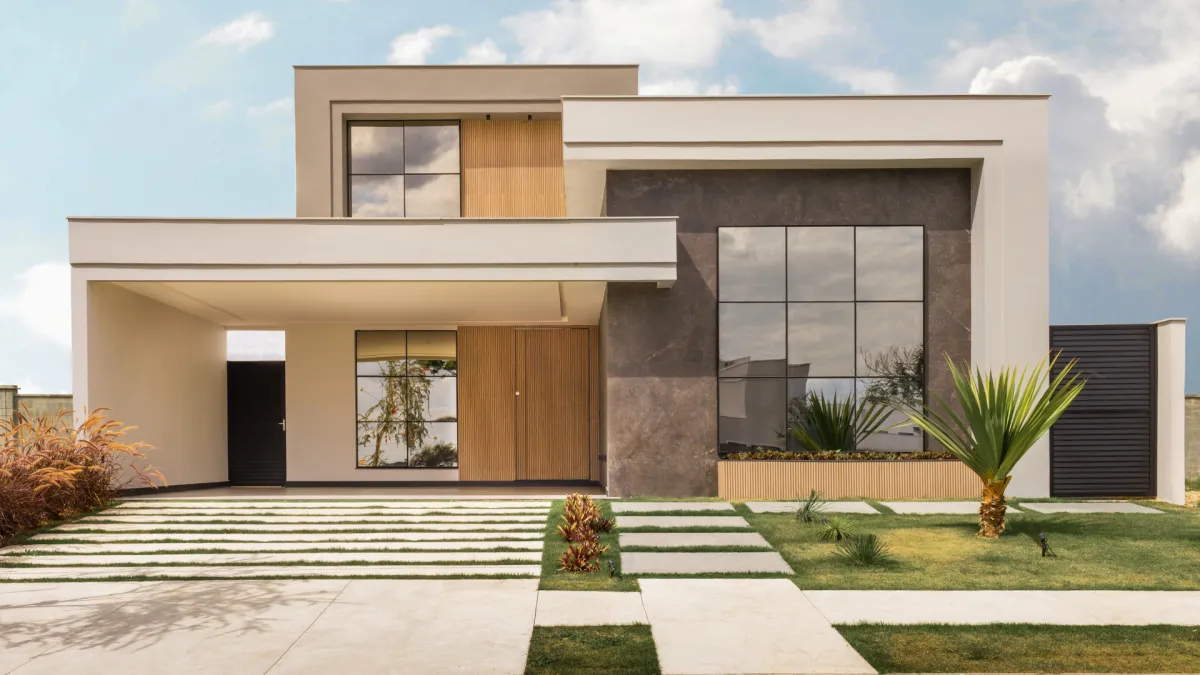 a modern house with a pool in the middle of the yard