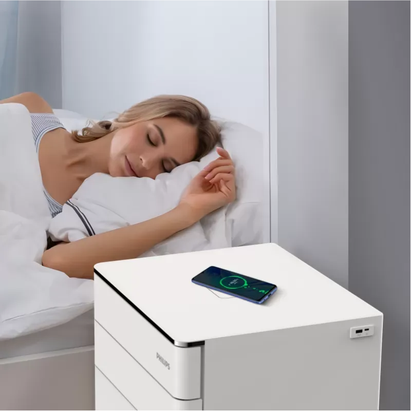 Caja fuerte Philips integrada como mesa de luz en un dormitorio