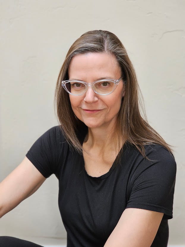 Maurene Janiece sitting