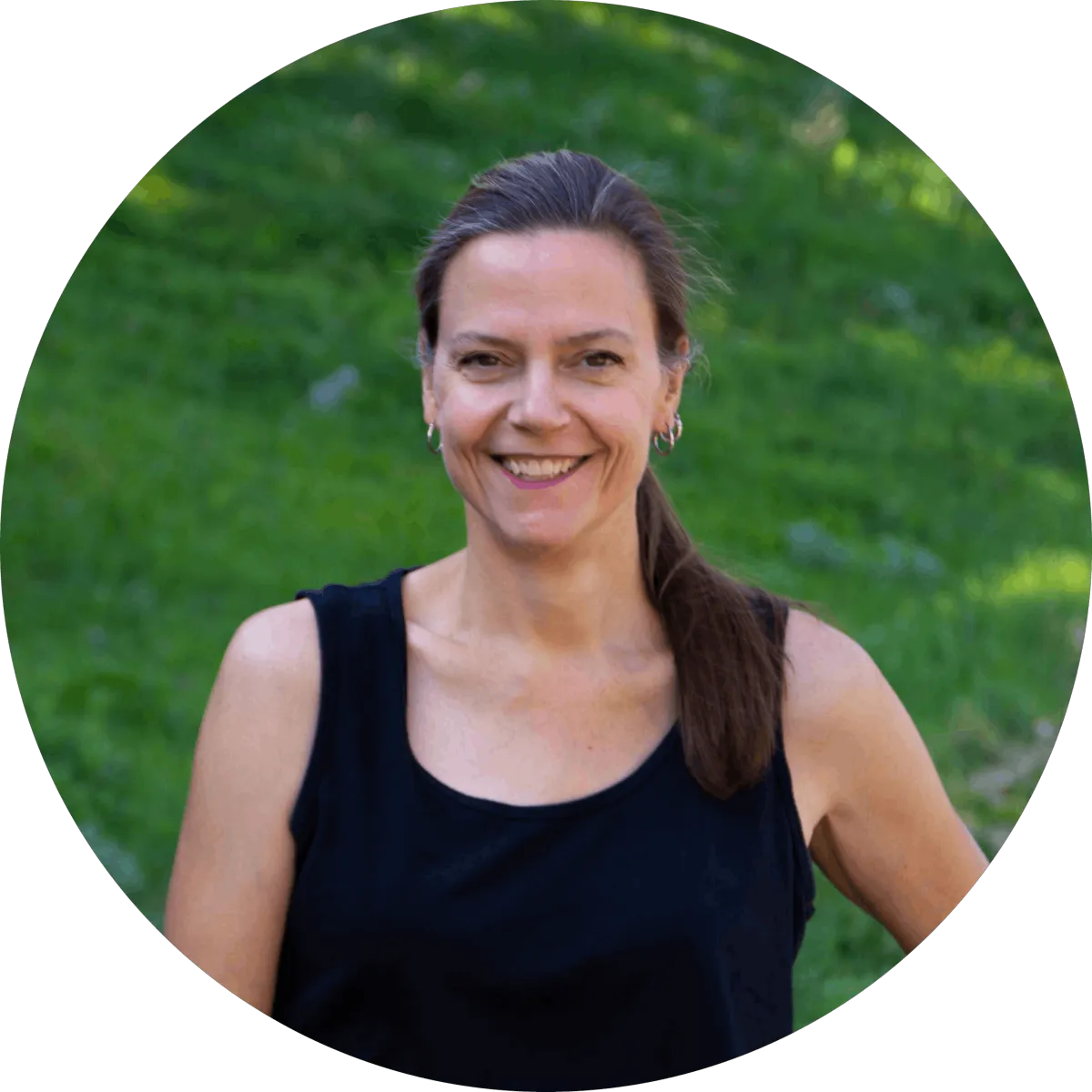 Message into Motion photo of pencils, keyboard, and open notebook on a white table.