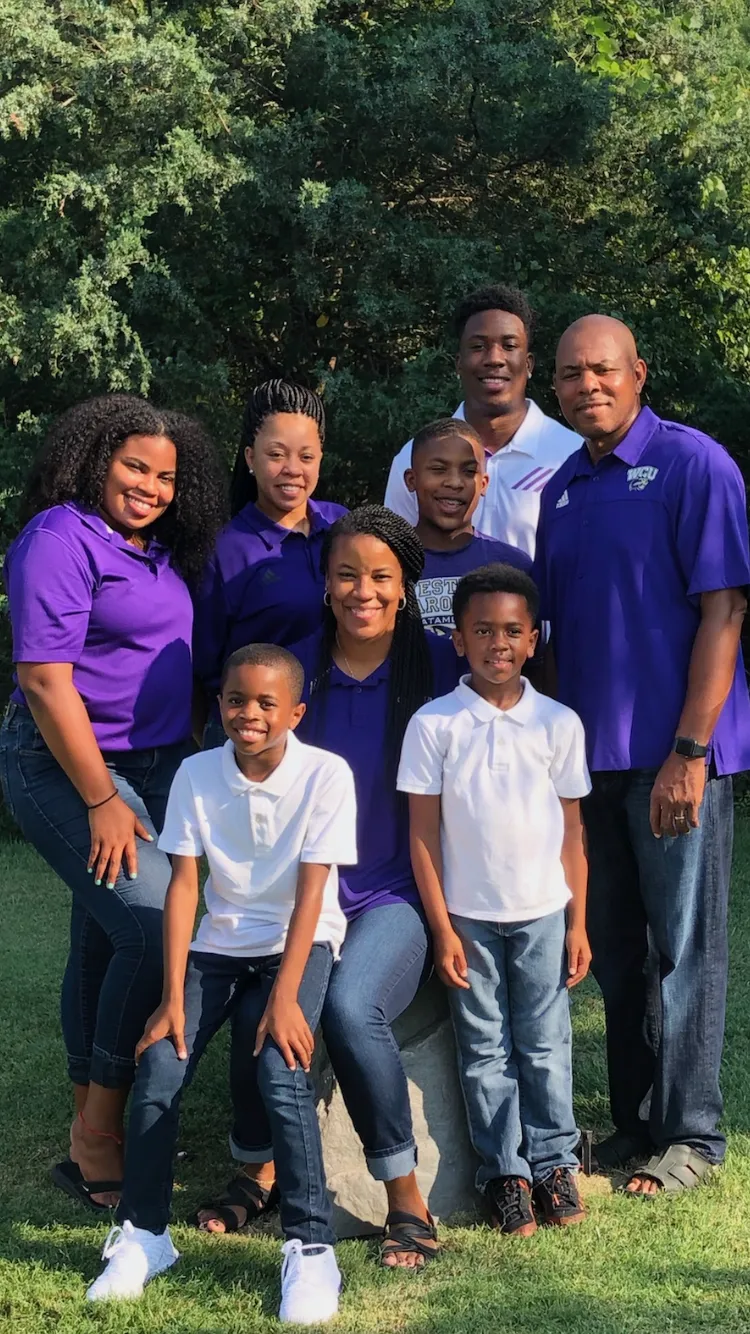 coach fussing at football player