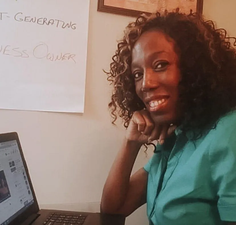 Picture of Simone at her desk
