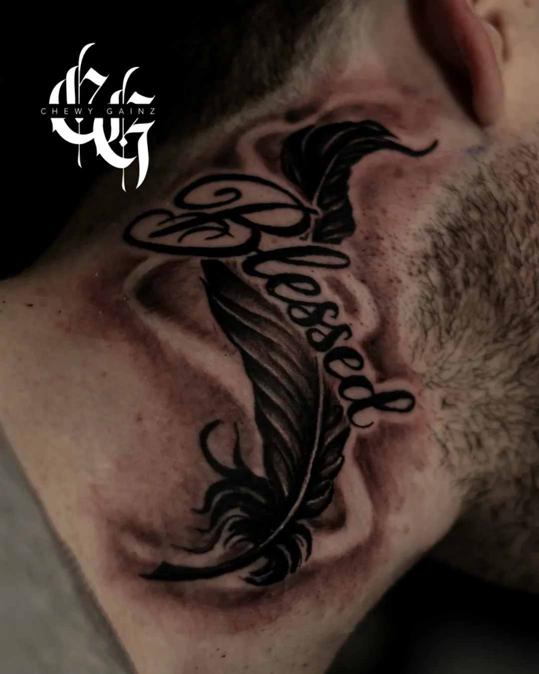 Black and grey realism and surrealism tattoo artist in Warren, Ohio applying a custom stencil and beginning fine-detail tattoo work on a client’s arm inside a professional tattoo studio.