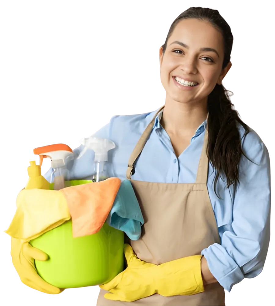 Smiling woman holding a cleaning bucket with supplies.
