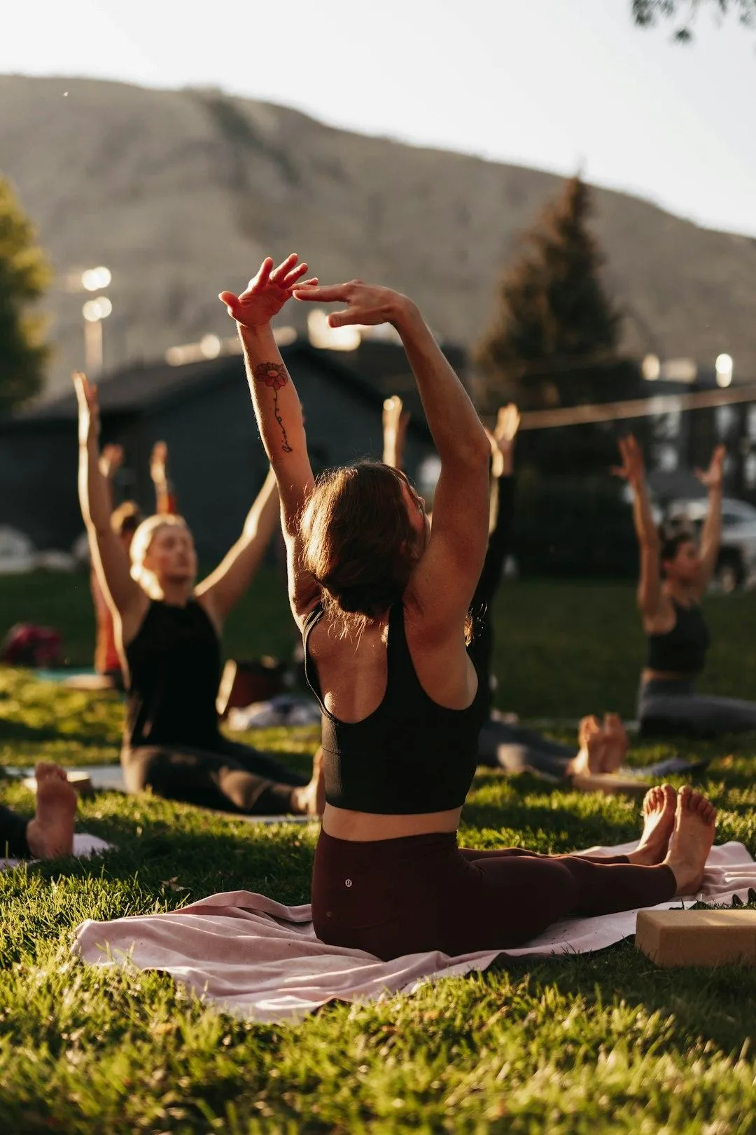 A group of people sitting around a fire