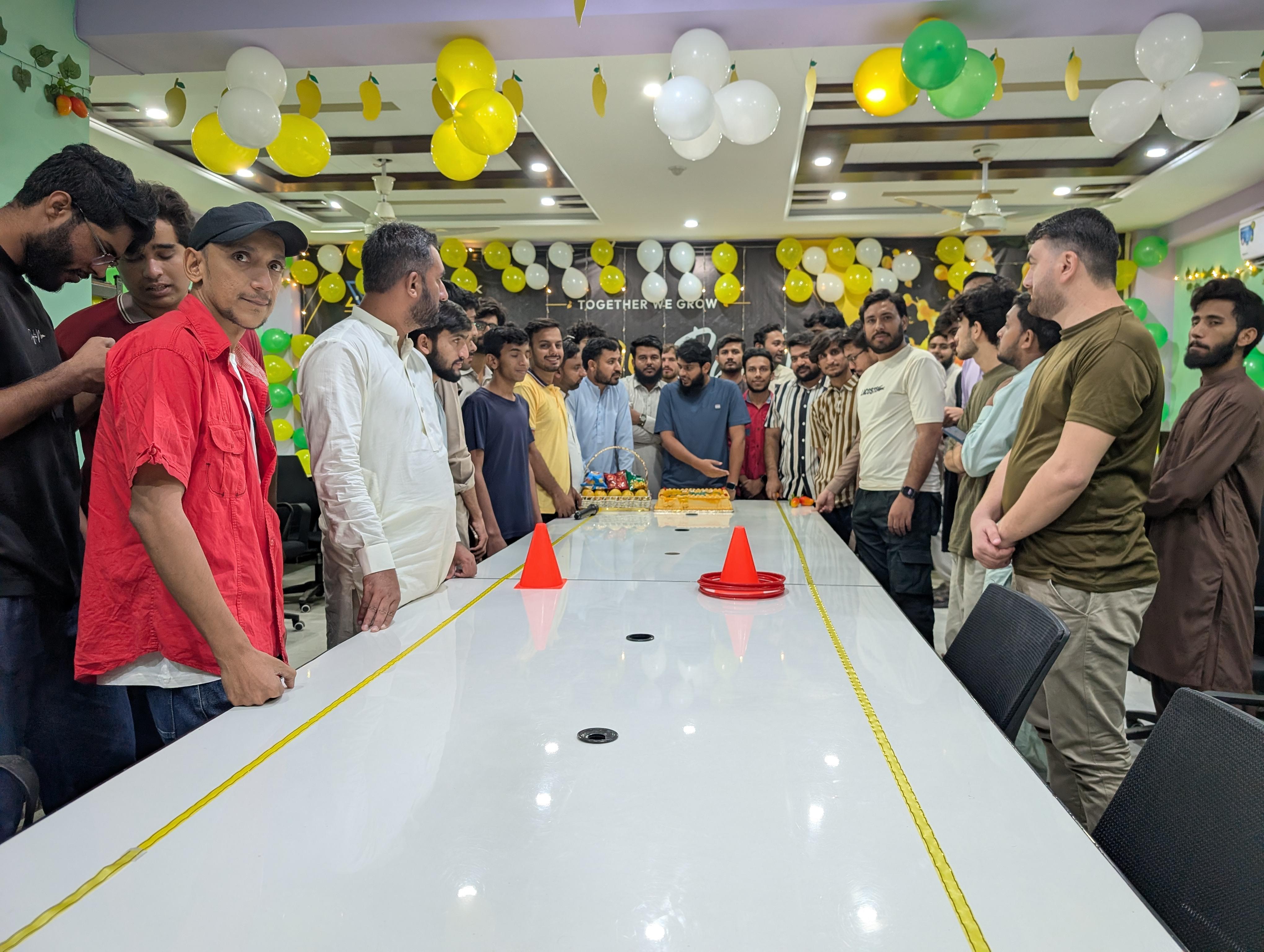 XortLogix team members and leadership celebrating team culture and synergy at the company mango party event