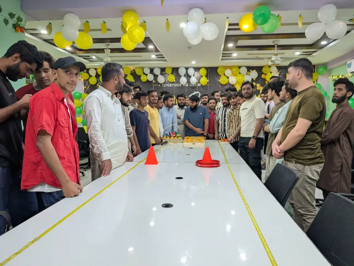 XortLogix team members and leadership celebrating team culture and synergy at the company mango party event