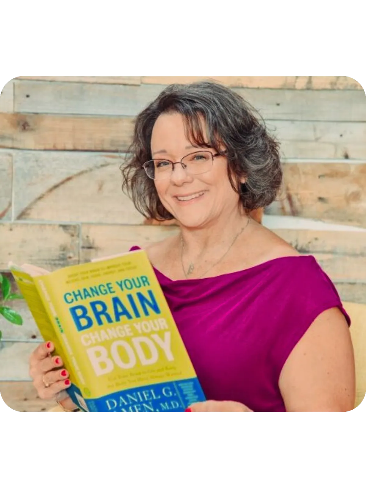 Dr. Blades with "Change Your Brain.." Book in hand