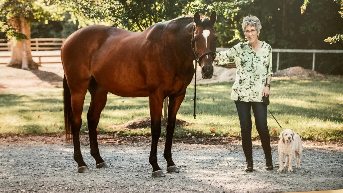 Cholena Erickson with her horse and her dog in Chapel Hill, NC