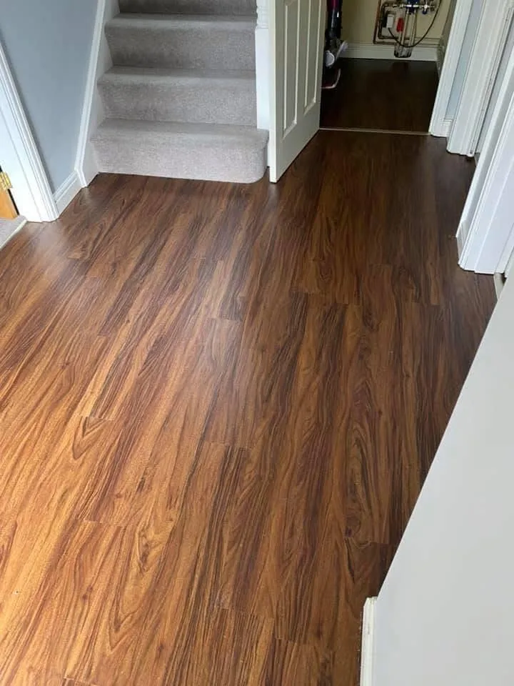 Close up image of luxurious brown LVT flooring