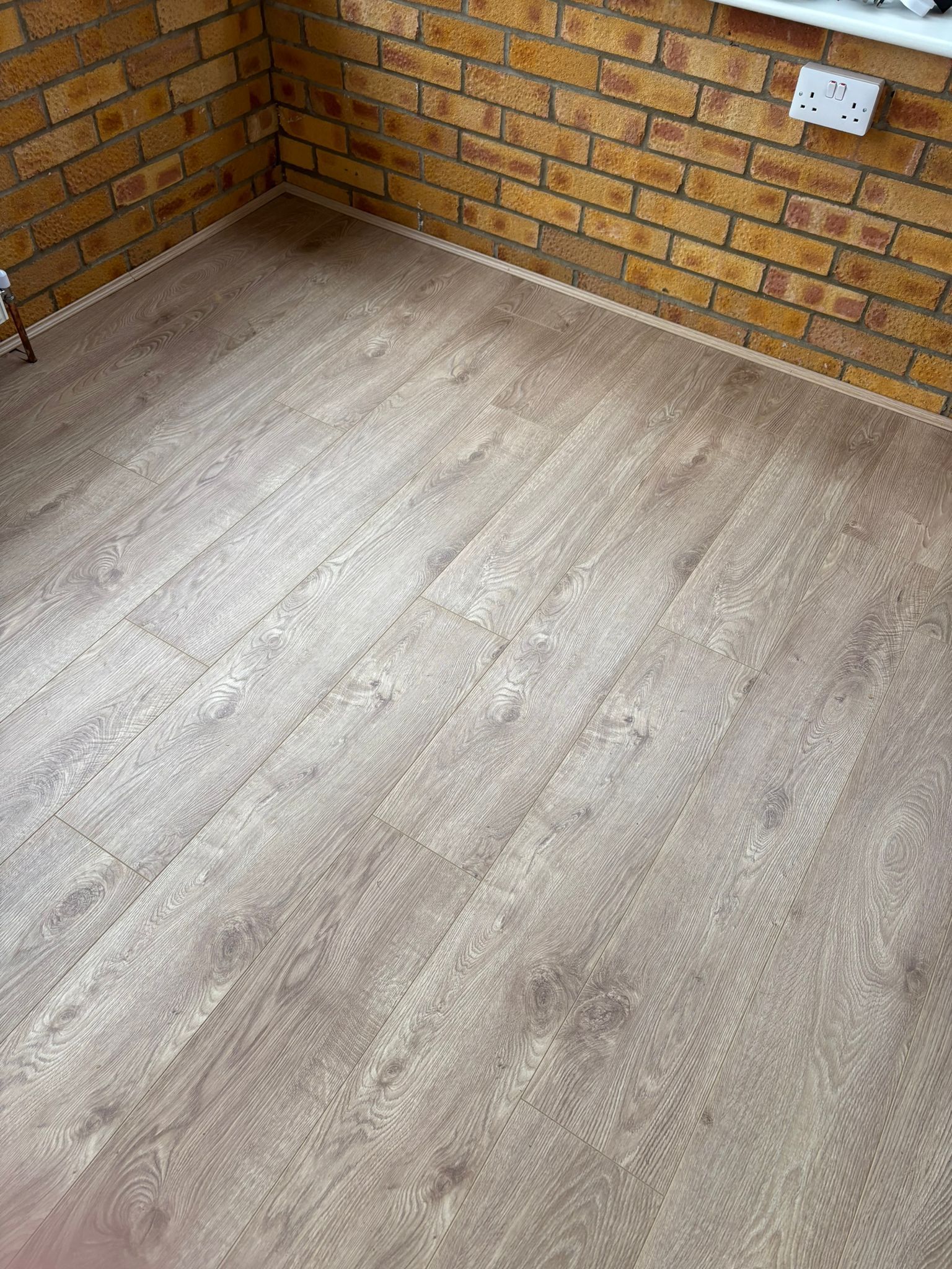 Close up of off-grey laminate flooring