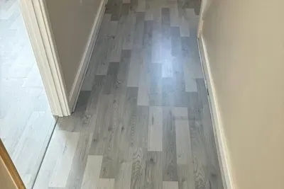 Grey vinyl flooring in a hallway