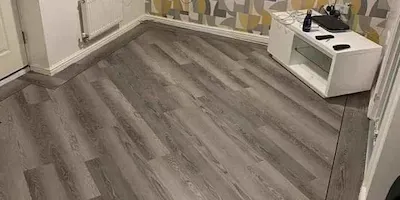 Grey laminate flooring in a play room