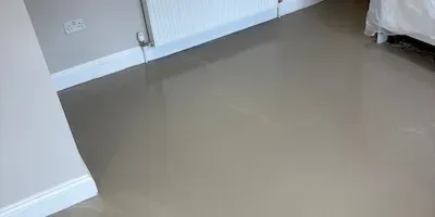 Ultra smooth self-levelling compound laid down in preperation for LVT