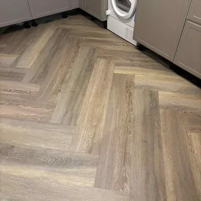 Herringbone LVT flooring fitted in a utility room in Boston, Lincolnshire.