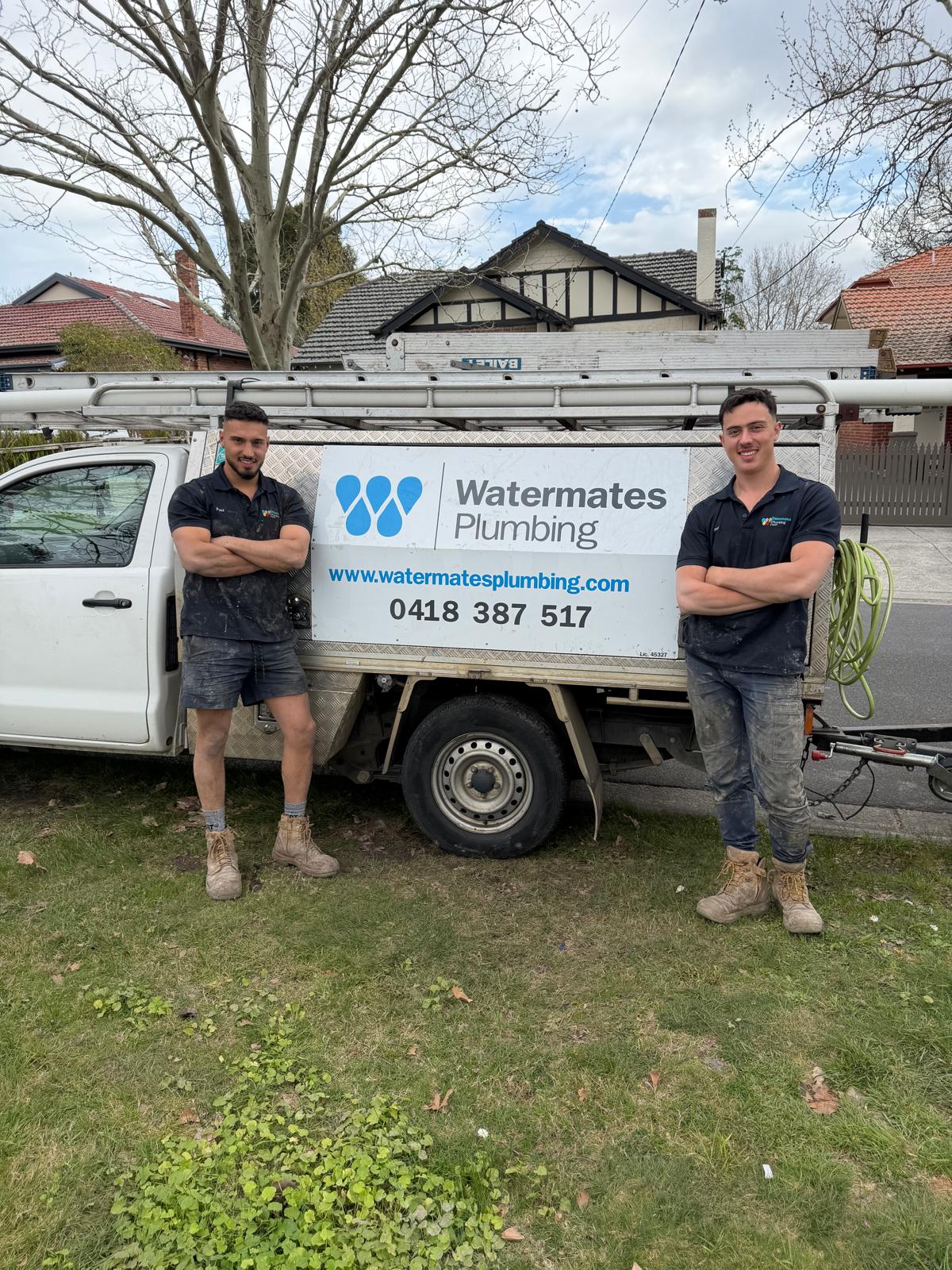 Friendly Watermates plumbing professional arriving at a property
