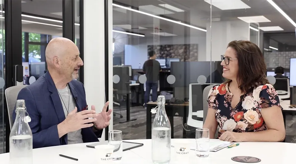 two people doing a podcast recording