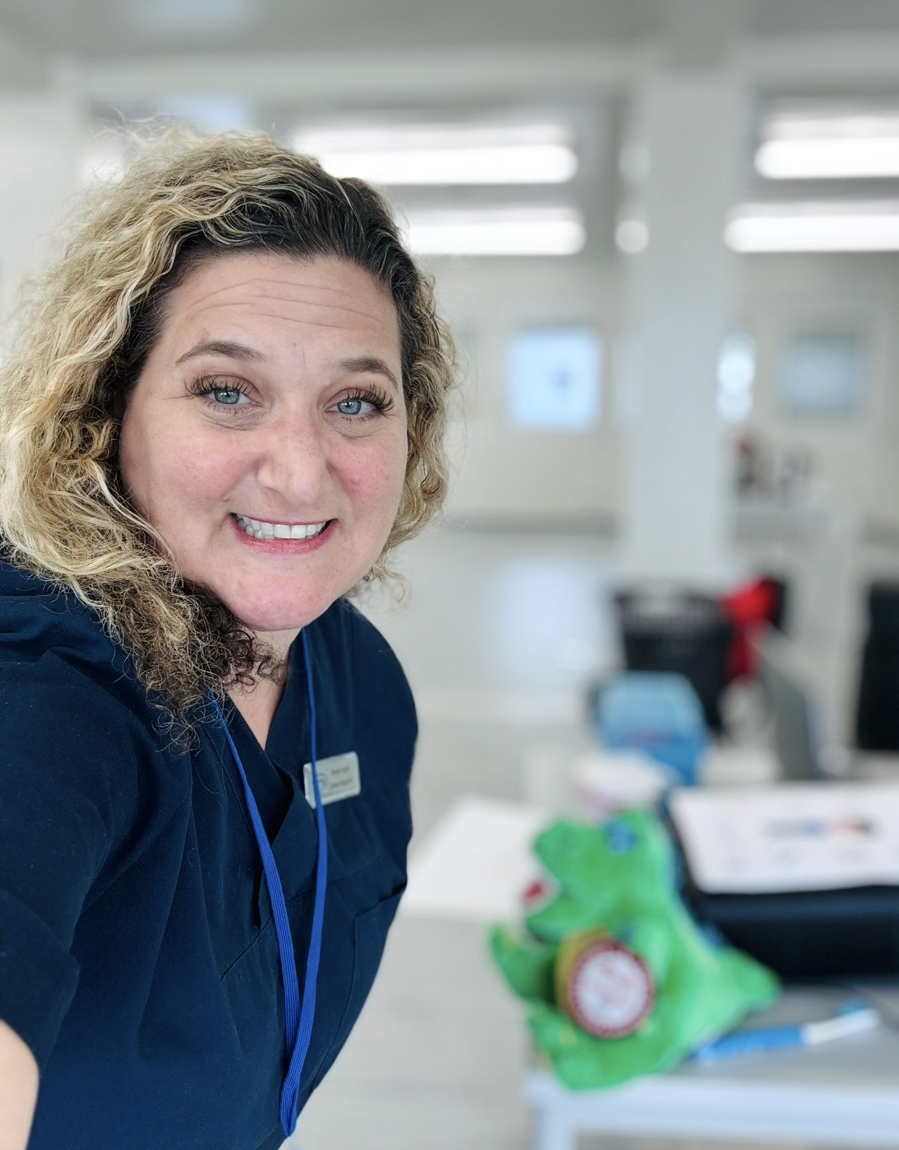 Hope in smiling in scrubs at mission in Germany