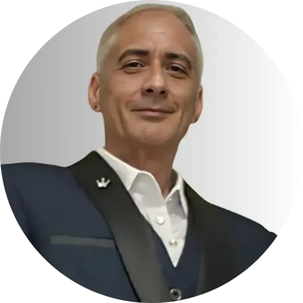 A professional portrait of J. Kimo Collins, founder of Gather4Grace, smiling warmly to welcome visitors to the sanctuary.