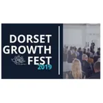 Dorset Growth Fest 2019 logo with audience at a speaking event, highlighting community engagement and public speaking opportunities.