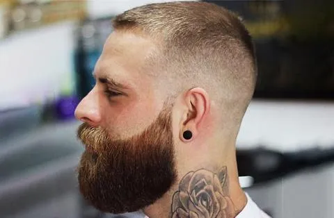 Clean low taper fade on male client by professional barber