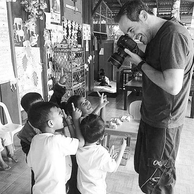 Founder, John D. Russell working with a nonprofit in Cambodia