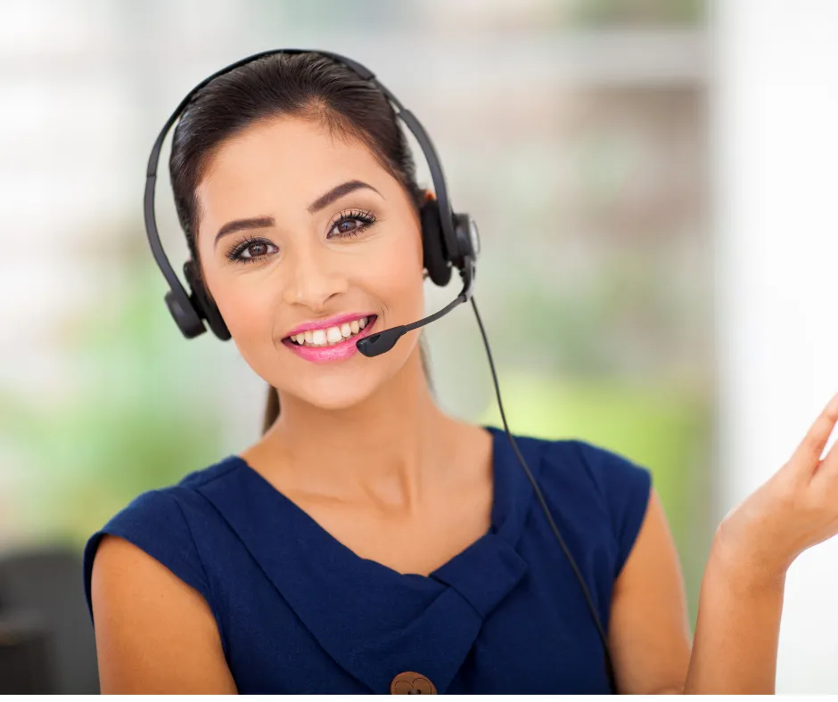 friendly receptionist on the phone with a patient to schedule an echocardiogram.