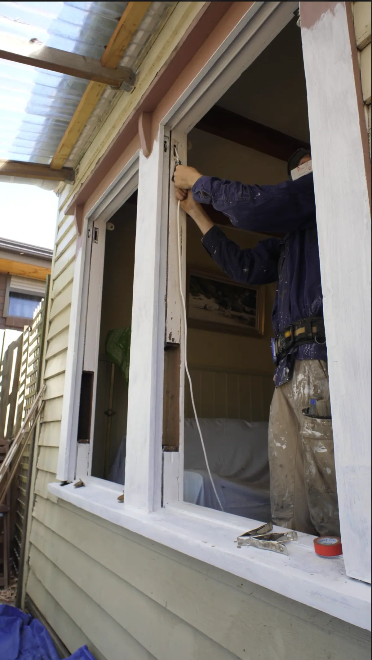 Photo of Thermawood Australia crew working on timber window retrofit double glazing installation