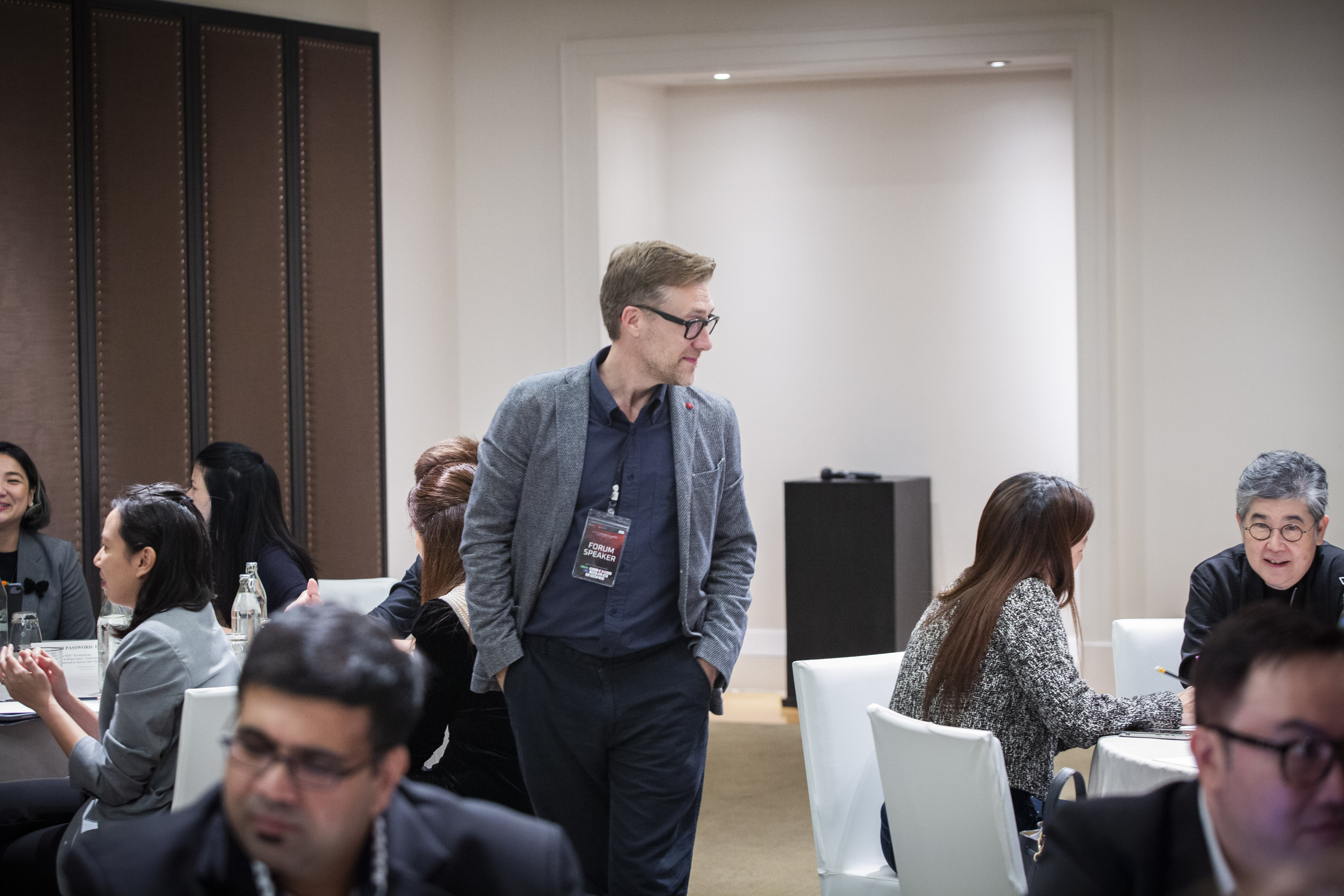 Gary over looking professionals working