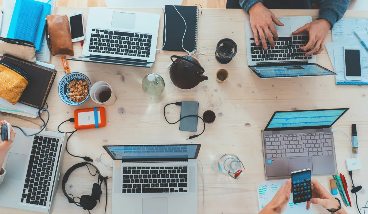 Professionals working together on new innovation methods, image credit unsplah by Mervin