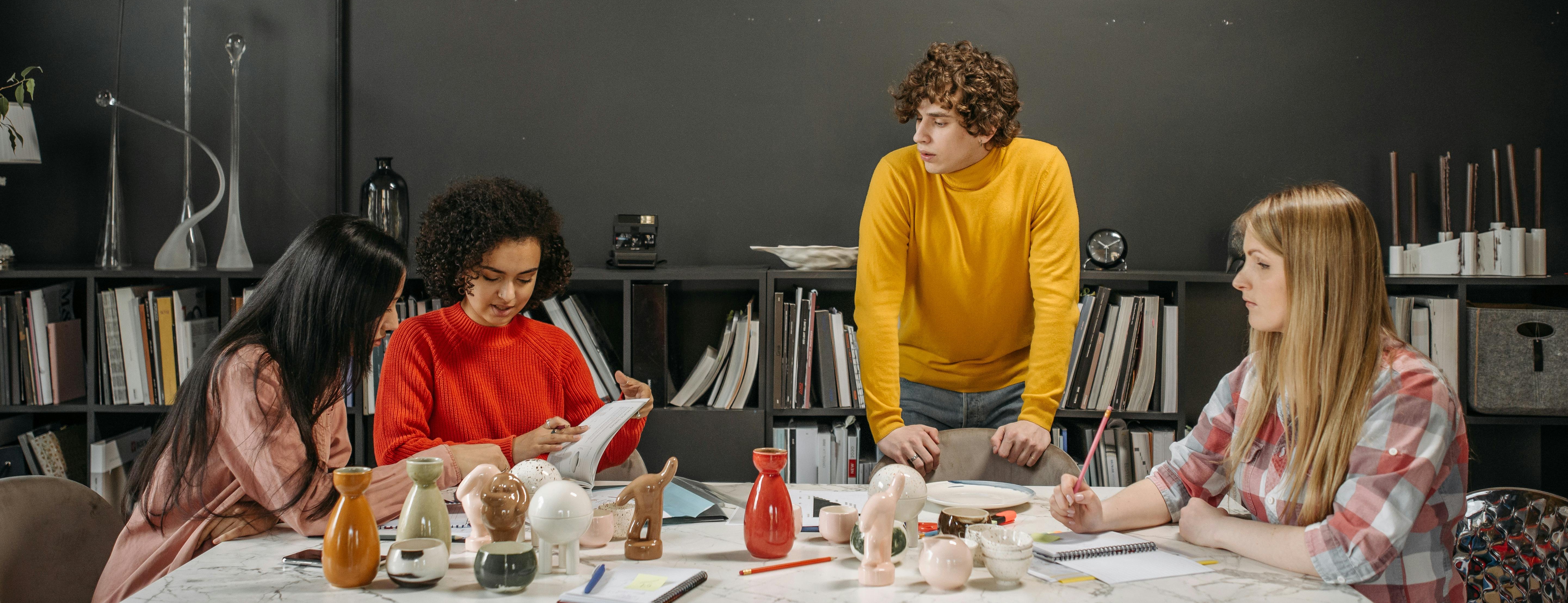 Image of brain storming session Photo by Pavel Danilyuk: https://www.pexels.com/photo/young-businesspeople-having-a-business-meeting-7674629/