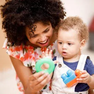 mom playing with toddler