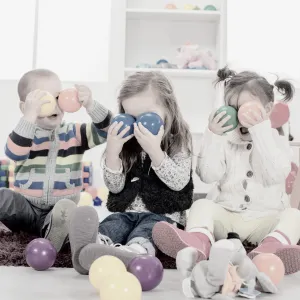 kids playing with toy balls