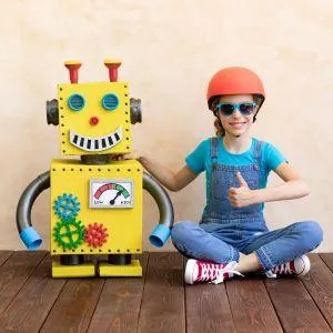 kids with a built robot