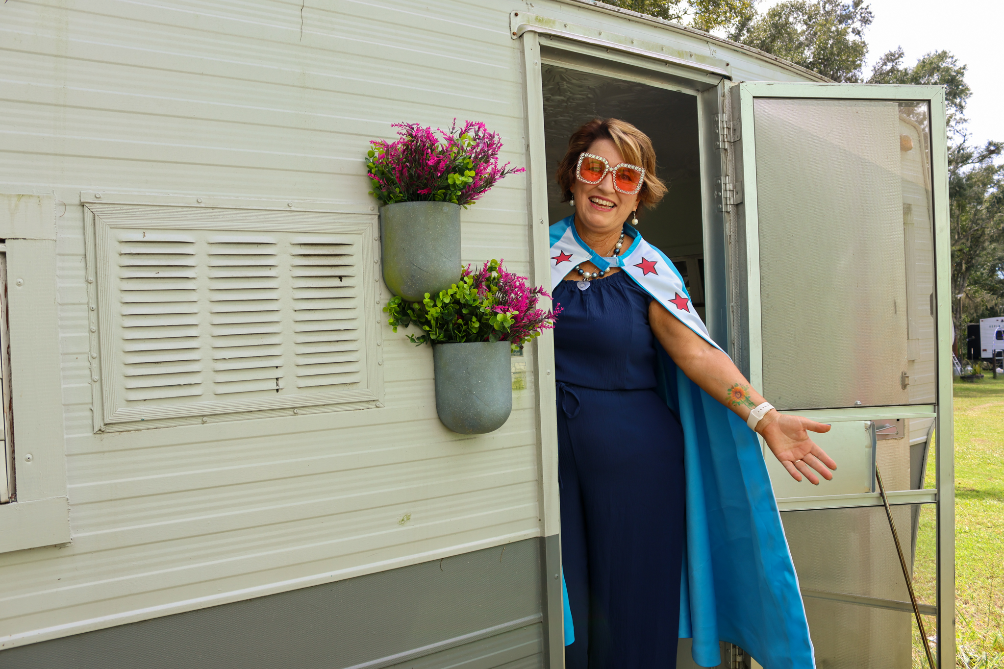 Coach Pearl Standing smiling in SHERO League