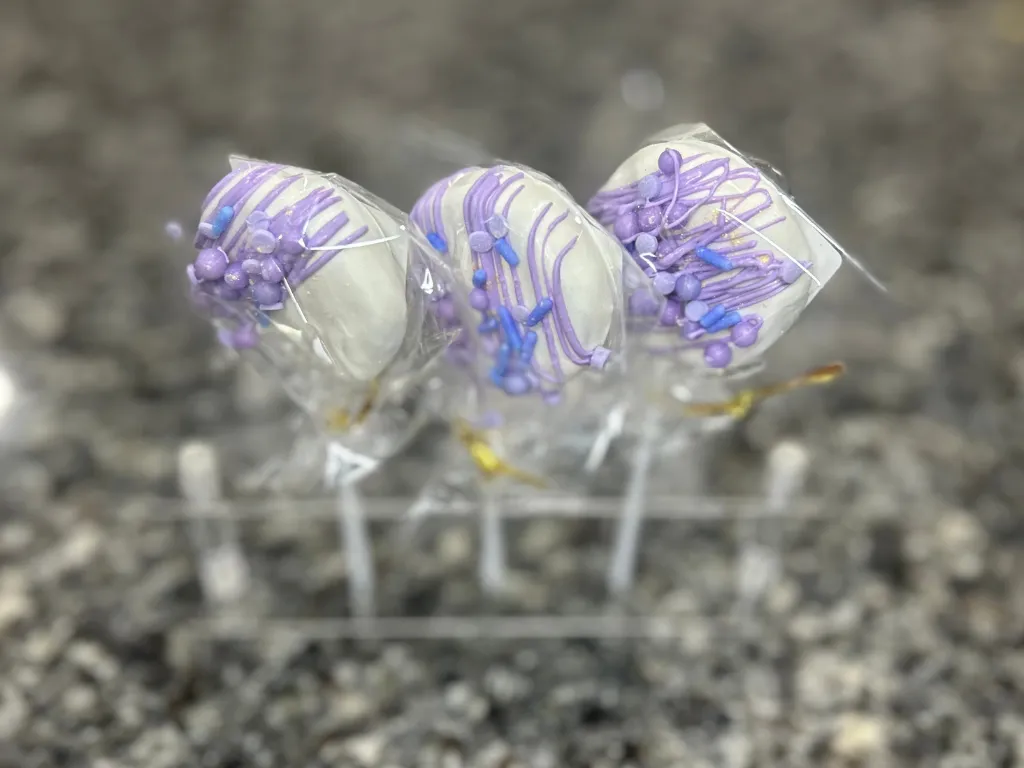 Assorted colorful cake pops by Tasting Colors