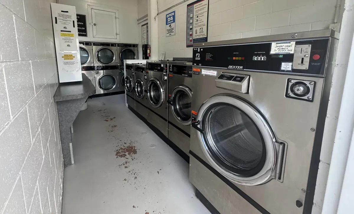 Dexter washers and high-efficiency dryers inside the Ride n Shine laundromat in Enderby