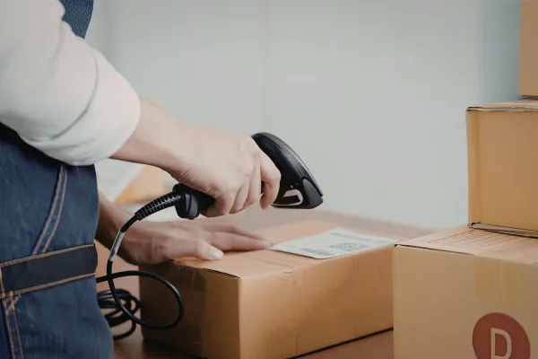 Inventory count scene (clipboard + barcode scanner / phone scanning)