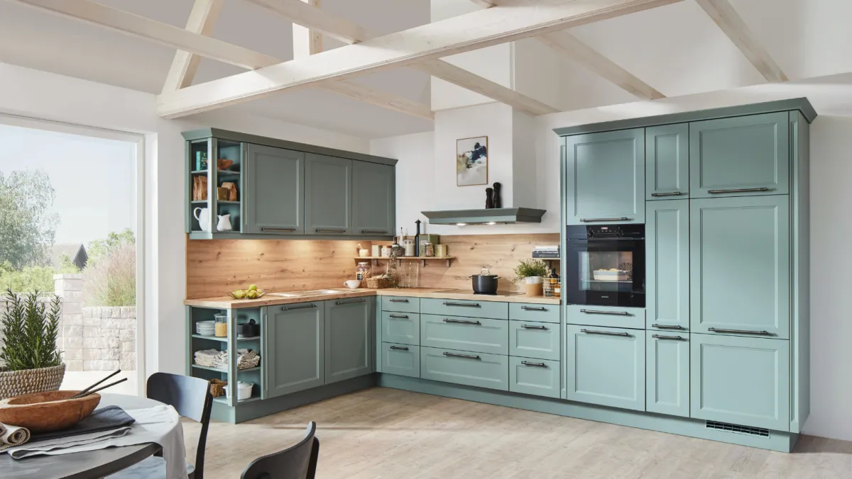 Picture of a kitchen with painted cabinets.