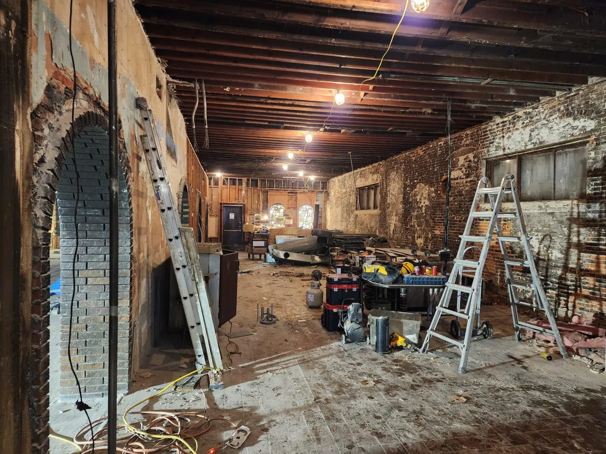 Tear-out of fire or flood-damaged property, including removal of drywall, flooring, ceilings, and debris down to the studs