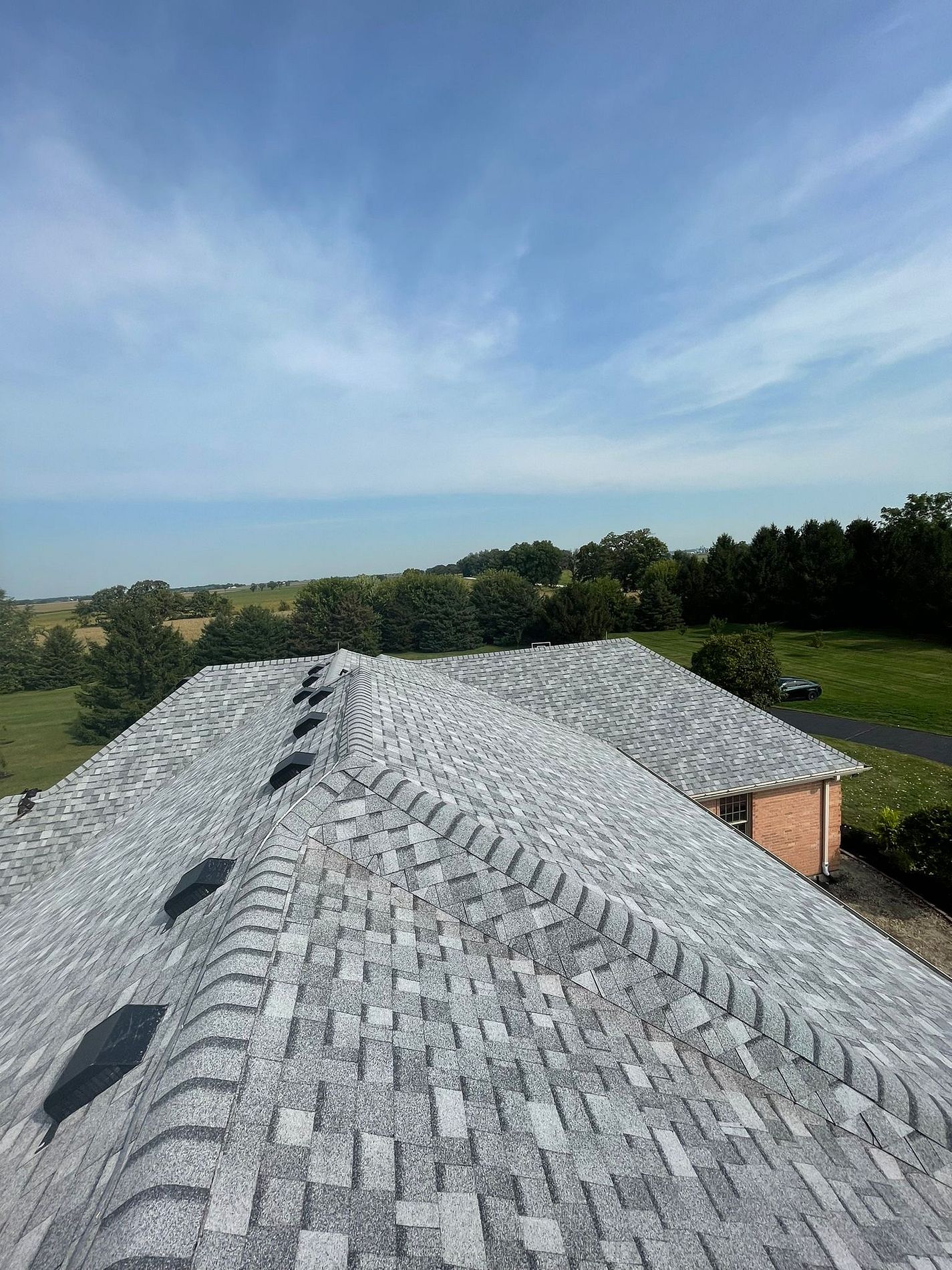 Local roofing contractor logo for Rockford, Illinois – Warner Roofing & Restoration