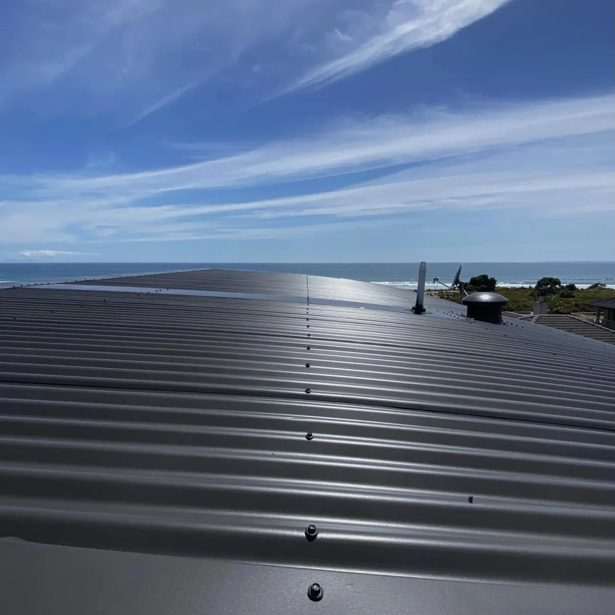 Restored metal roof with fresh paint