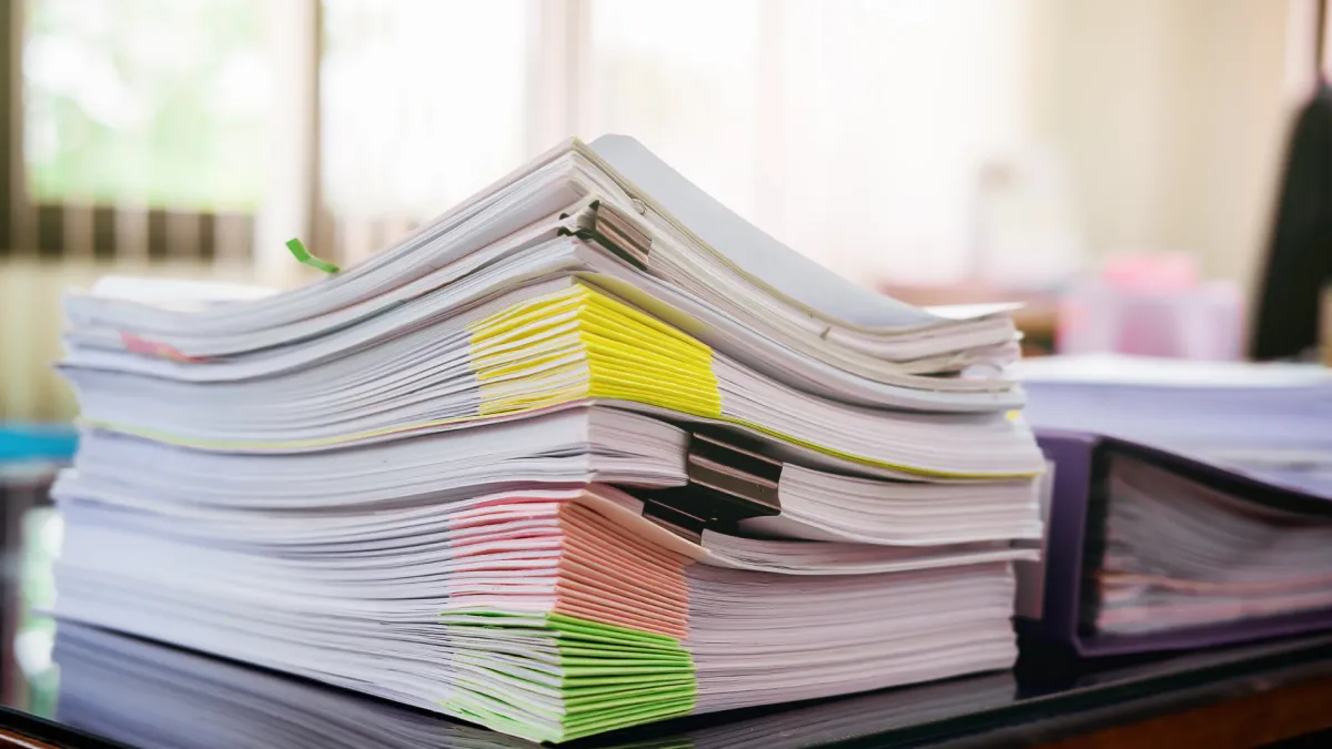 Organized paperwork for catch-up bookkeeping services