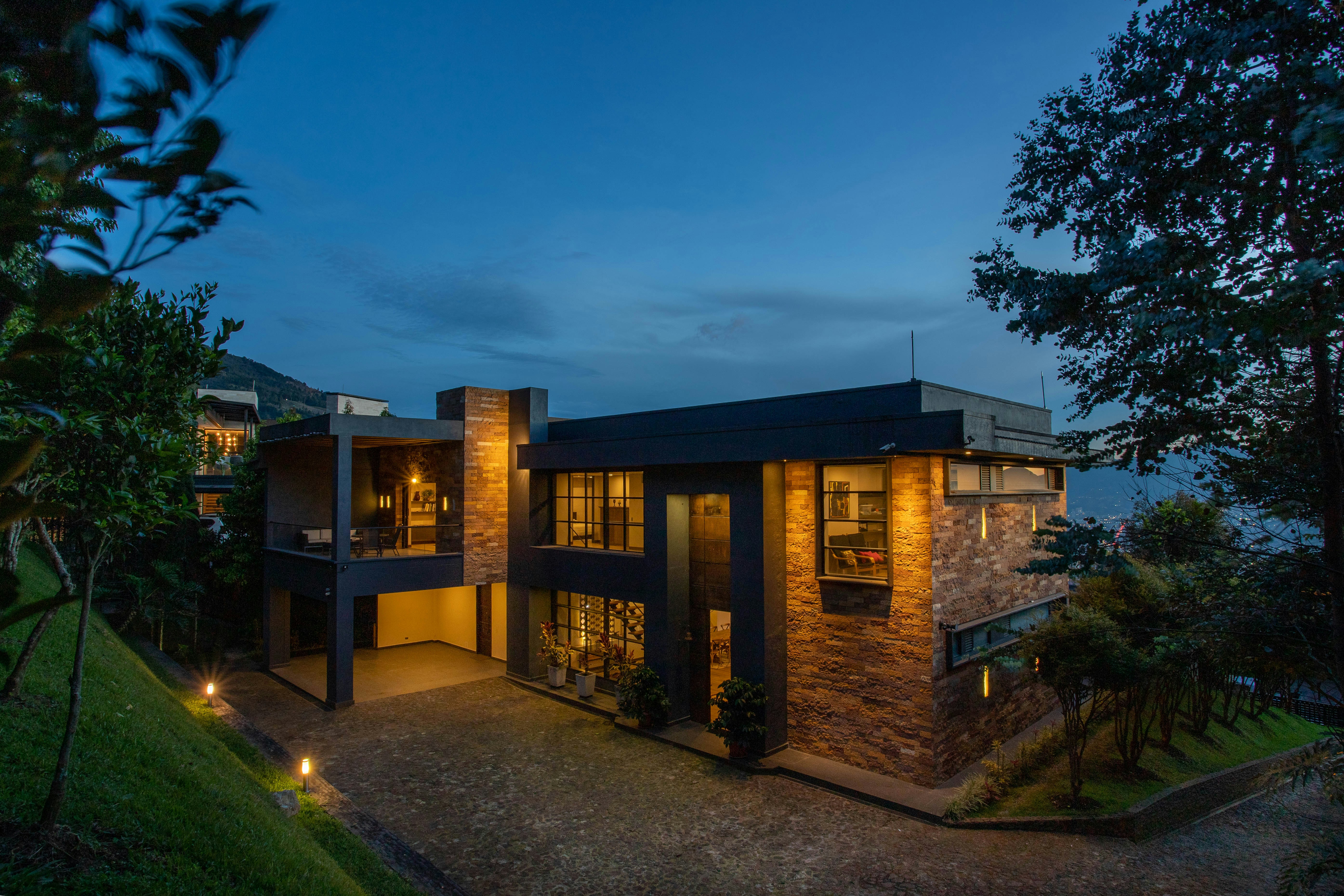 a rendering of a modern house with palm trees