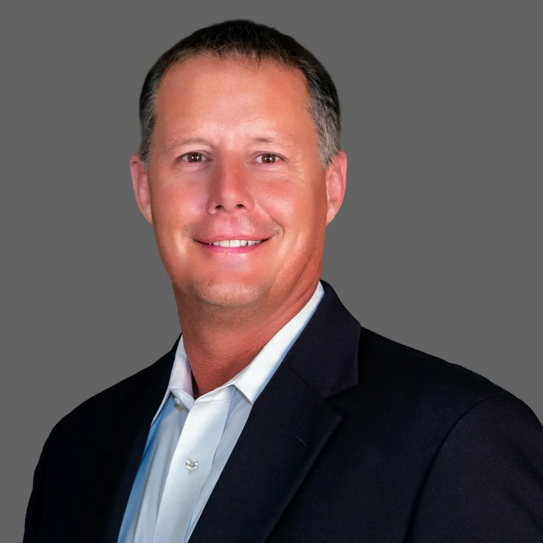 a modern house with a large front yard