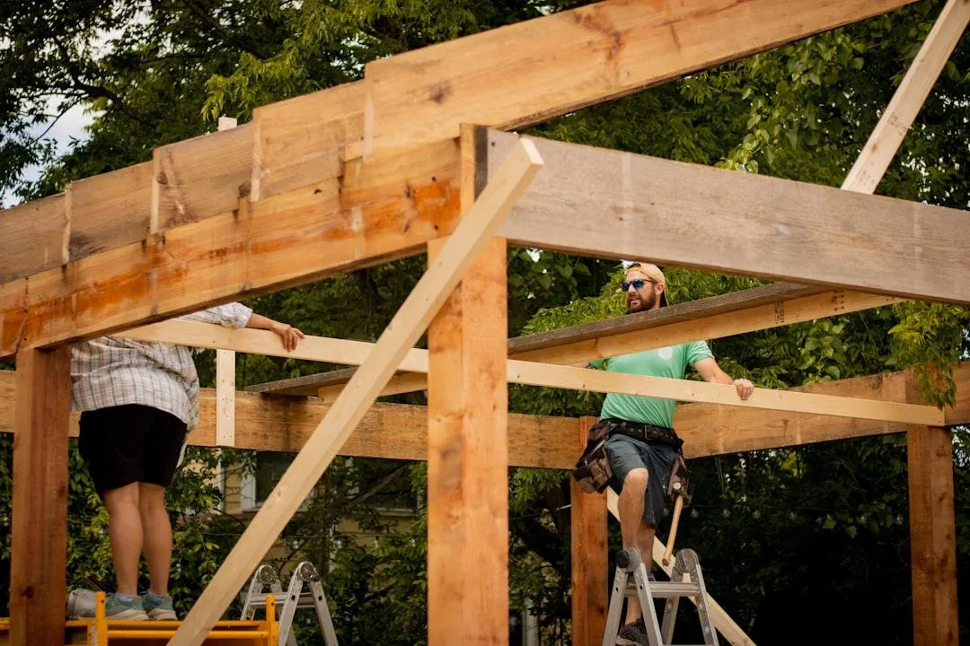 Home buider on a ladder