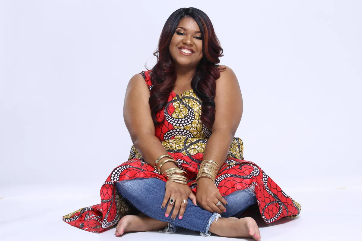 A long row of shelves filled with lots of books